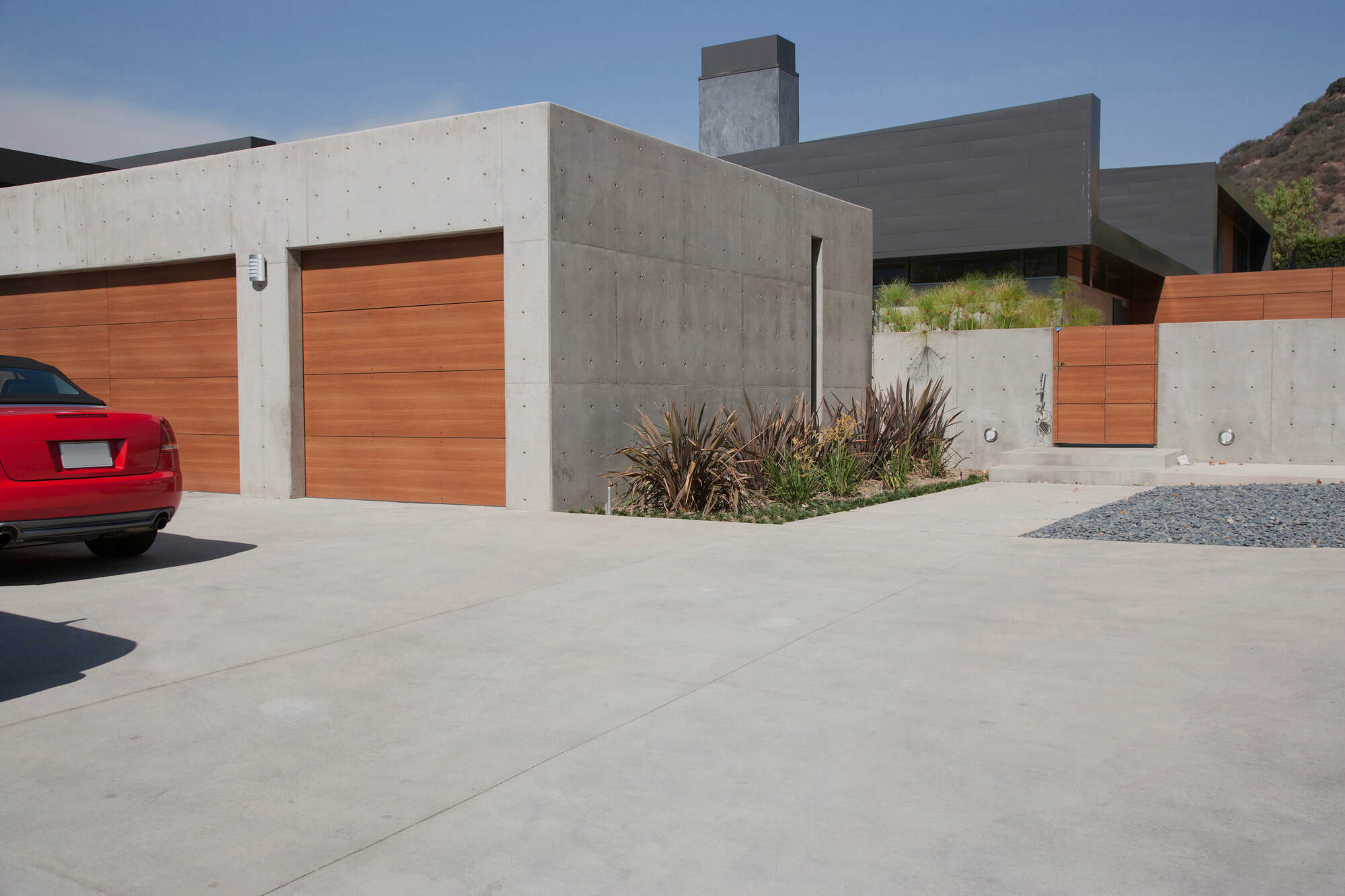 Modern home with a wide concrete driveway
